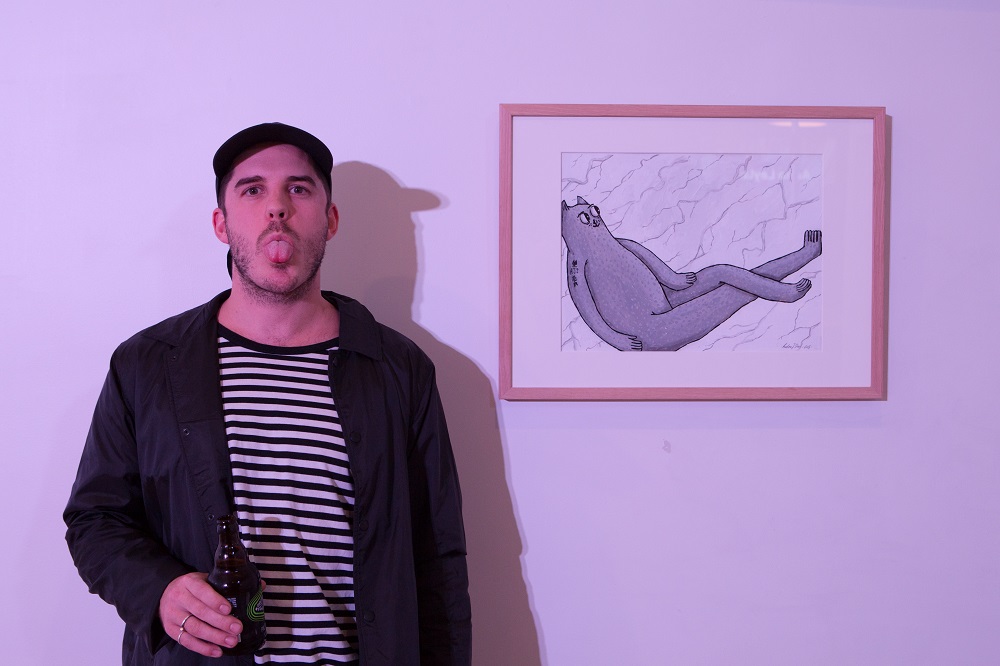 Andrew with his piece to be auctioned, called "laid back". 